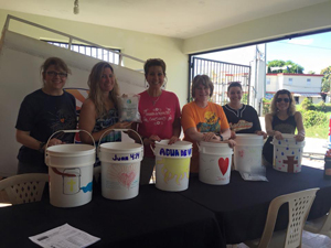 Team distributing water filters to the community of San Pablo