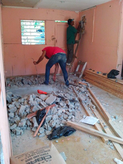 Demolition in of the existing  kitchen and working on the electricity